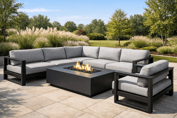 Modern outdoor patio seating around a fire pit with sectional sofa