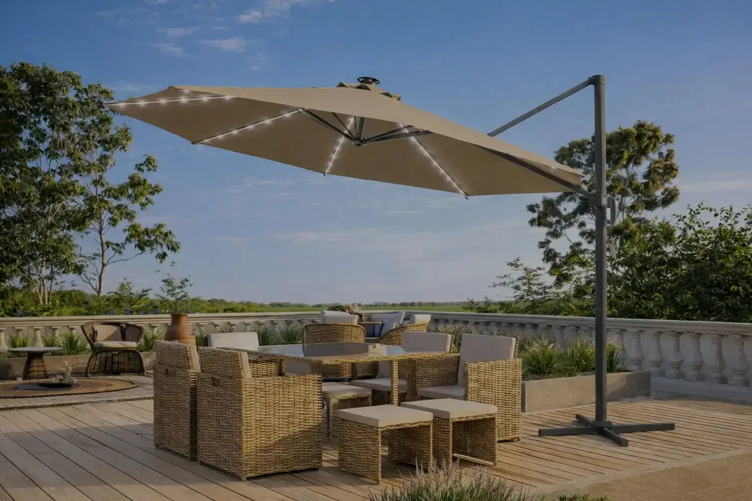 Large cantilever patio umbrella shading an outdoor wicker dining set on a wooden deck